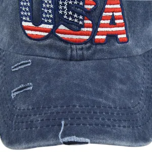 Close-up of USA embroidery with stars and stripes pattern on vintage navy baseball cap