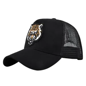 Close-up of a tiger head embroidery on a black mesh trucker baseball sun hat