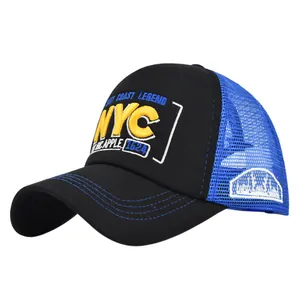 Detailed view of the breathable blue mesh and 3D NYC embroidery on the trucker hat