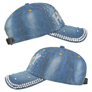 Detail view of washed blue denim baseball cap with sparkling HK rhinestone lettering
