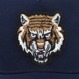 Dark blue baseball cap featuring a high-density tiger head embroidery in 3D stitch style