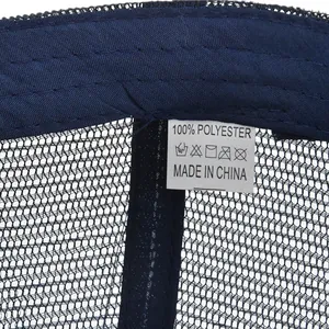 Detailed macro view of the internal breathable mesh and polyester care label of the cap