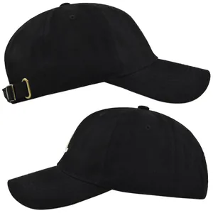 Detail view of cotton twill baseball cap with golden metal buckle and side embroidery
