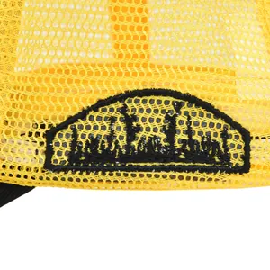 Detail of breathable yellow mesh and 3D embroidery patch on the baseball trucker hat