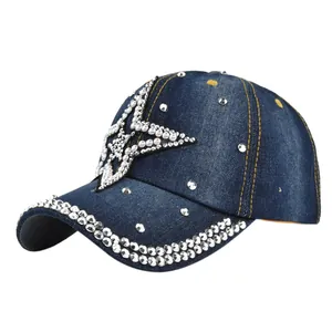 Dark blue denim baseball cap with rhinestone star embellishments and yellow stitching