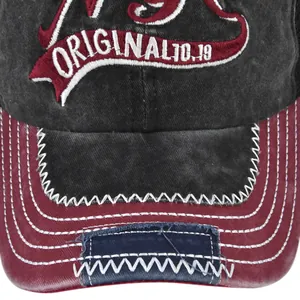 Detailaufnahme der Vintage-Baseballkappe mit Stickerei und kontrastierenden Nähten