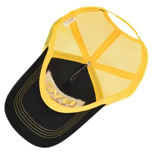 Detail view of cotton trucker hat featuring breathable yellow mesh and NYC embroidery