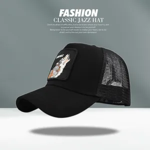 Close-up of black mesh trucker hat with Lone Wolf embroidered patch and breathable back