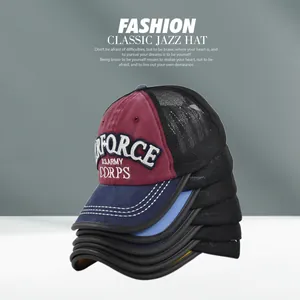 Detail of Air Force embroidery on wine red and navy blue mesh trucker baseball cap