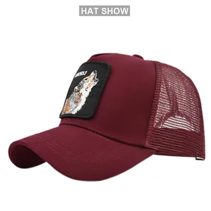 Close-up of deep red mesh baseball cap with embroidered wolf patch and breathable back