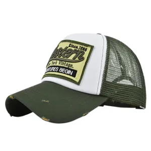 Detailed side view of vintage mesh trucker hat with Western embroidery and worn brim edge