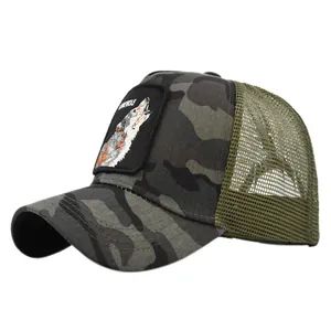 Close-up of wolf patch embroidery on camouflage mesh trucker cap with lone wolf text