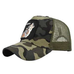 Close-up of camouflage trucker hat featuring embroidered wolf patch and green mesh back