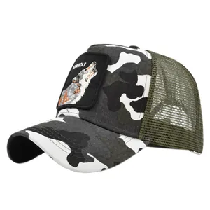 Detail of lone wolf embroidery patch on camouflage mesh trucker hat with breathable net