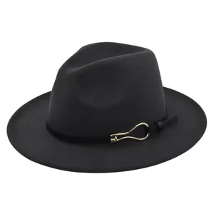 Close-up of black wool felt fedora featuring a decorative band and gold metal buckle
