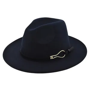 Detail of dark blue wool fedora with a black decorative band and gold metal buckle