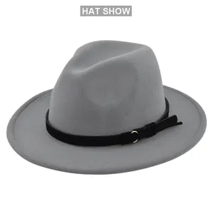 Detail of gray wool fedora hat with black suede belt and decorative metal ring buckle