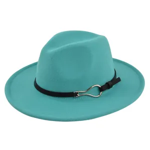 Detail of teal wool fedora hat featuring a black leather band and silver metal buckle