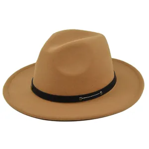 Detail of camel wool fedora with black leather band and silver metal stud embellishments