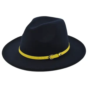 Detail of navy wool fedora hat featuring contrast yellow leather belt with silver buckle