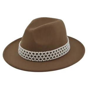 Detailed view of a brown wool fedora hat featuring elegant four-layer white pearl bands