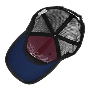 Detailed macro view of the 100% cotton inner lining and wash label on baseball cap