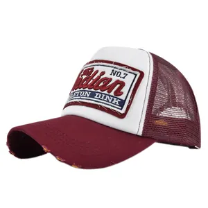 Vintage embroidered baseball mesh cap with burgundy brim and retro patch design