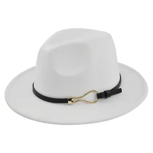 Detail of white felt fedora hat featuring black leather band and gold metal buckle