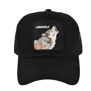 Black mesh trucker hat featuring a lone wolf embroidered patch on the front center