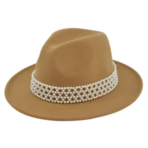 Close-up of khaki wool fedora hat with five rows of shiny pearl decorative bands