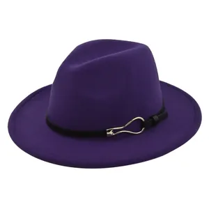 Close-up of deep purple wool felt fedora featuring a black leather band and silver metal buckle