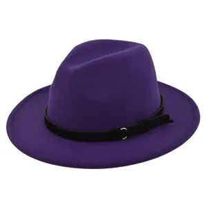 Detailed close-up of purple wool fedora hat with black band and gold buckle tassel