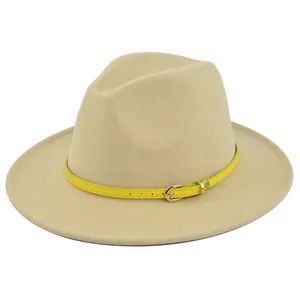 Detailed shot of felt jazz hat featuring a bright yellow leather belt with golden buckle