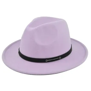 Detail of light purple wool fedora hat featuring black leather band with silver metal studs