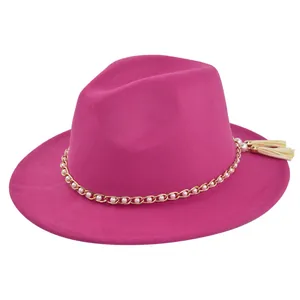 Detail of rose red wide brim fedora with gold chain, white pearls and fringe tassel accents