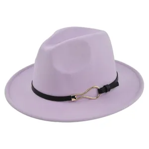 Detail of lavender fedora hat featuring a black leather band and gold metal buckle