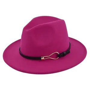 Detailed view of the fuchsia felt fedora hat featuring a black belt and golden metal buckle