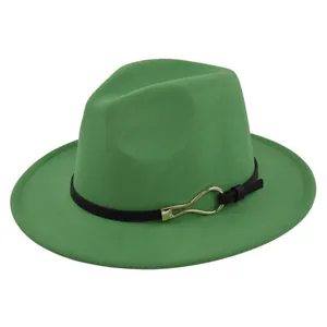 Detail of green wool jazz hat with black leather strap and gold metallic buckle
