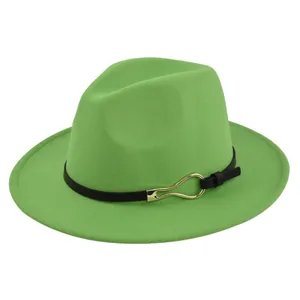 Close-up of grass green wool fedora hat featuring black leather band and gold buckle detail