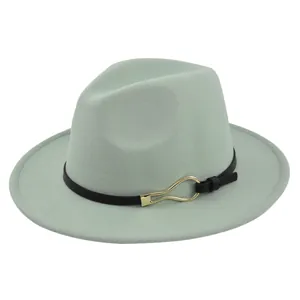 Detail of mint green wool fedora hat featuring a black leather band and gold metal buckle