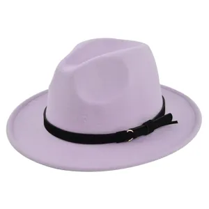 Detail of lavender fedora hat showing texture, black band and gold metal ring buckle