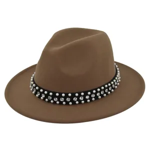 Close-up of the elegant pearl and rhinestone decoration on a wool felt jazz fedora hat