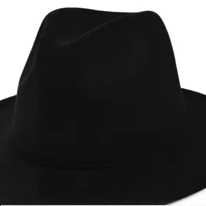 Close-up of black felt fedora hat crown with high-quality wool texture and neat stitching