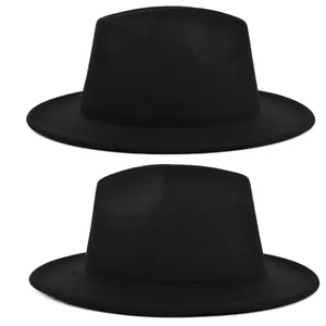 Detailed top and side view of two classic black wool felt wide-brim jazz hats on white