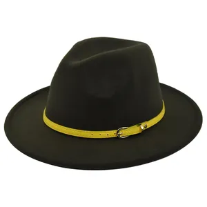 Detail of wide brim wool fedora hat with a contrasting yellow leather belt buckle