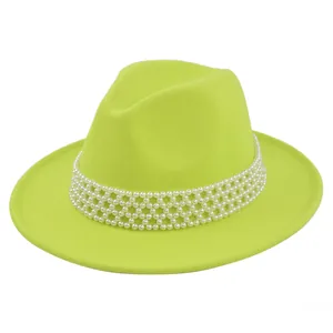 Detail of neon green wool fedora with four-layer white pearl mesh decorative headband