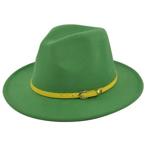 Detail of green fedora hat featuring a bright yellow leather belt with silver buckle clasp