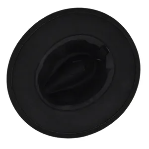 Detail view of the black felt hat interior showing the 65% cotton fabric care label