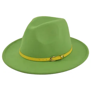 Detail of bright green felt fedora featuring a vibrant yellow belt with a gold buckle