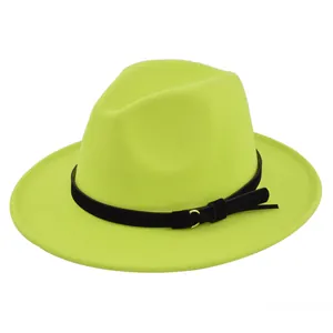Detail of neon green wide brim fedora hat with black belt and golden buckle